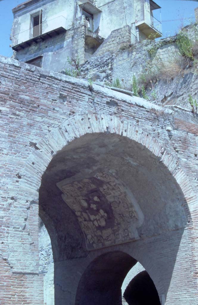 Herculaneum, 7th August 1976. Looking north-west towards upper east side of arch.
Photo courtesy of Rick Bauer, from Dr George Fay’s slides collection.